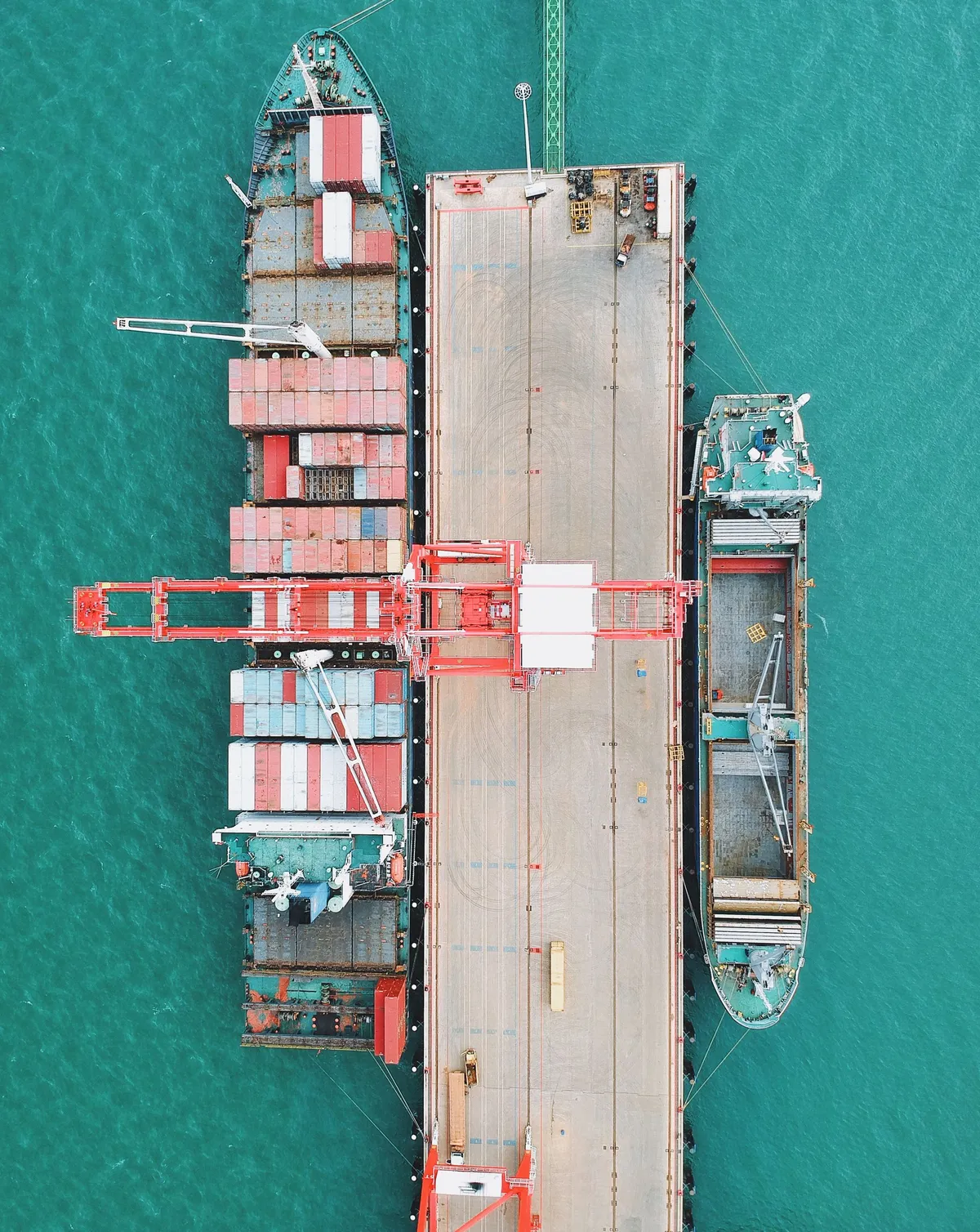 Commercial trucks at a Gulf port logistics yard